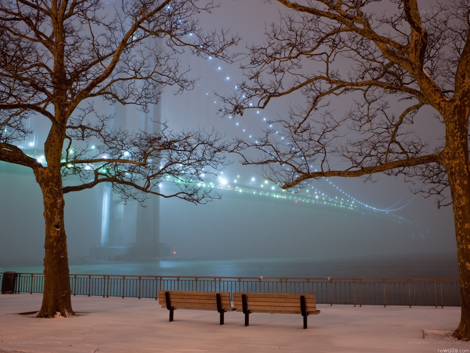 Foggy bridge at night