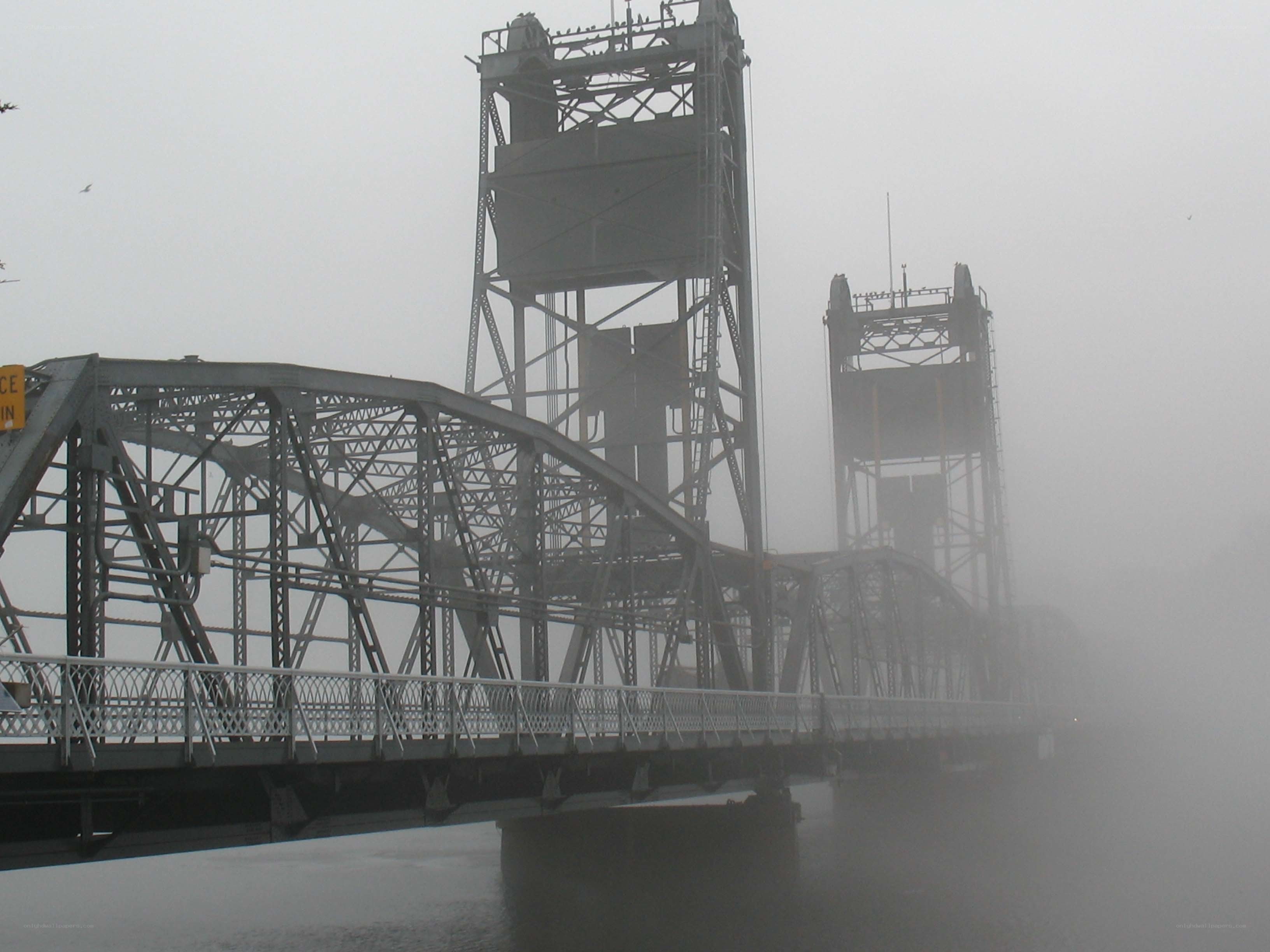Foggy bridge in mist