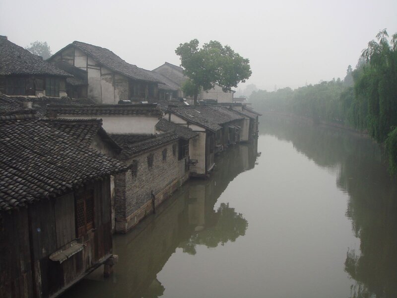 Foggy canal in ancient town