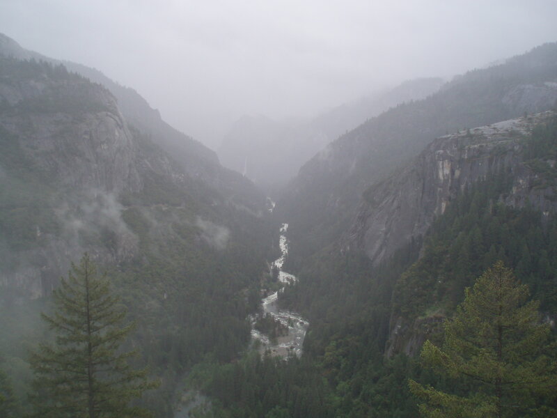 foggy canyon with river