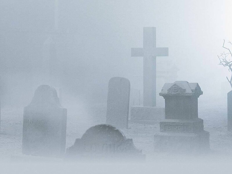 Foggy cemetery scene