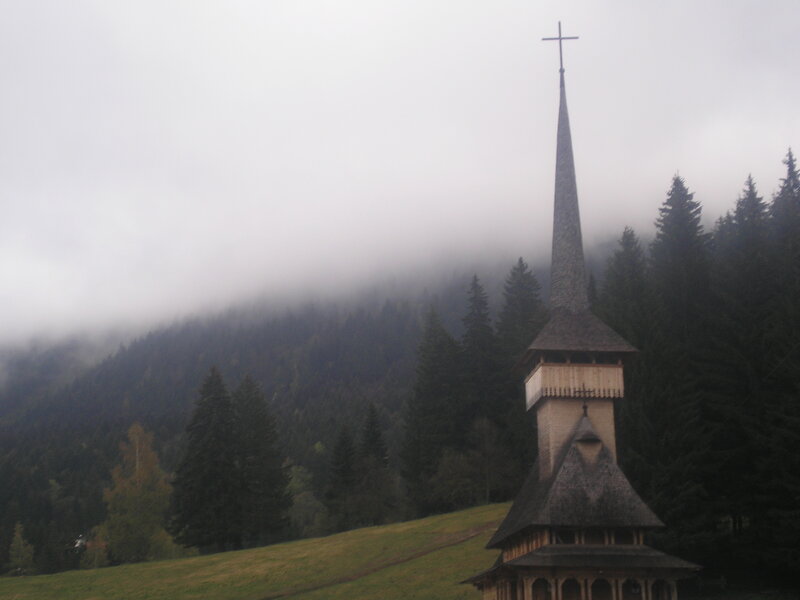 Foggy church in the mountains