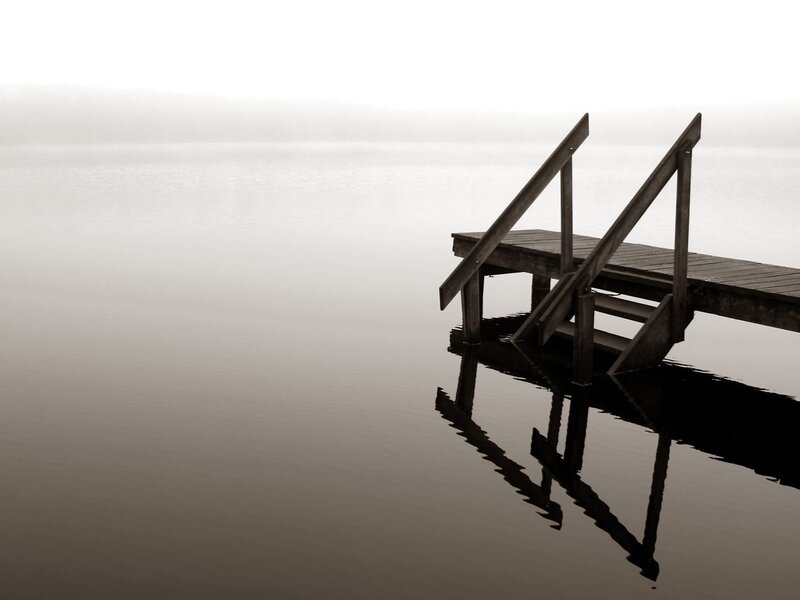 Foggy dock at dawn