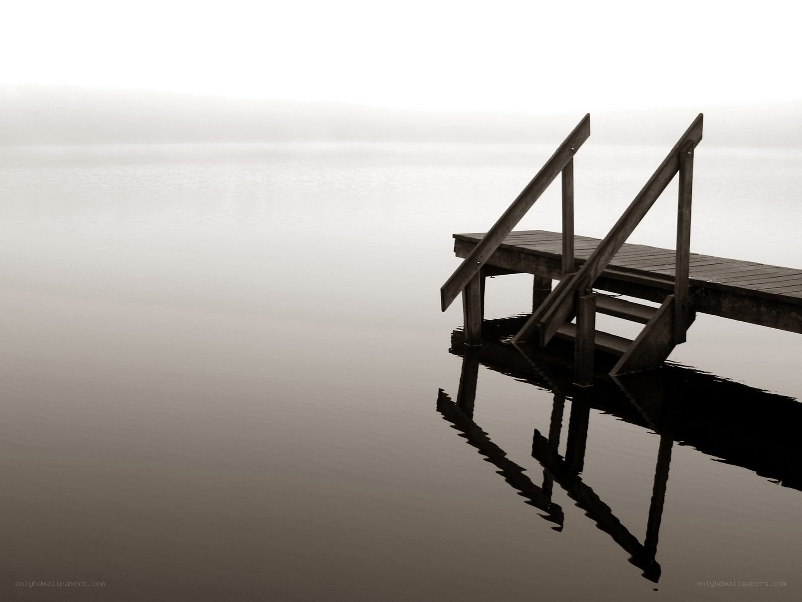 Foggy dock at dawn