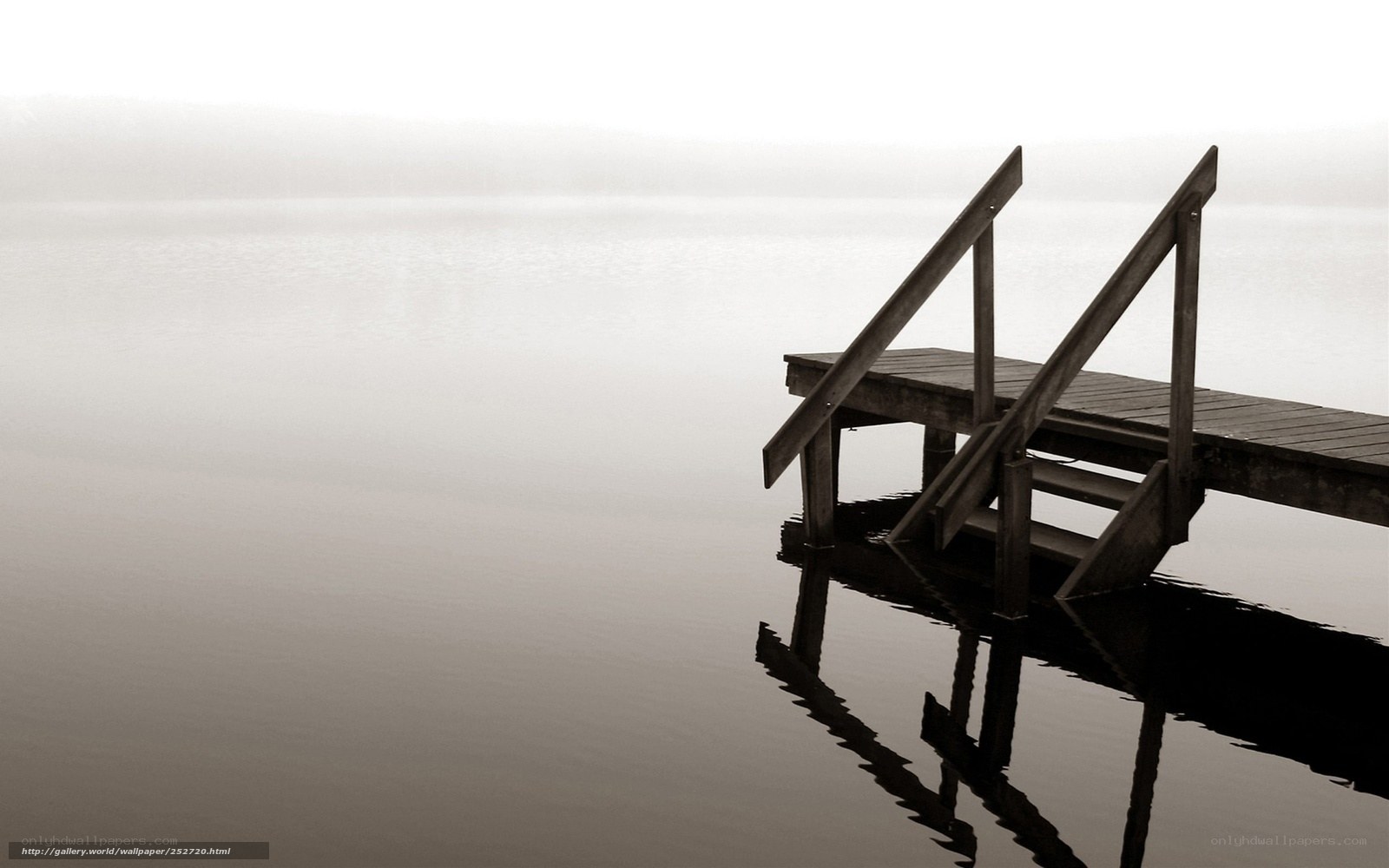 Foggy dock at dawn