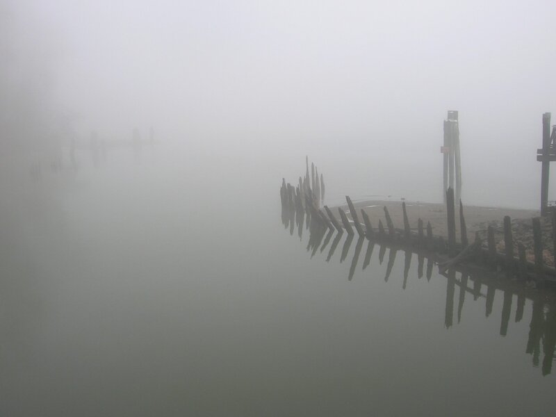 Foggy dock in mist