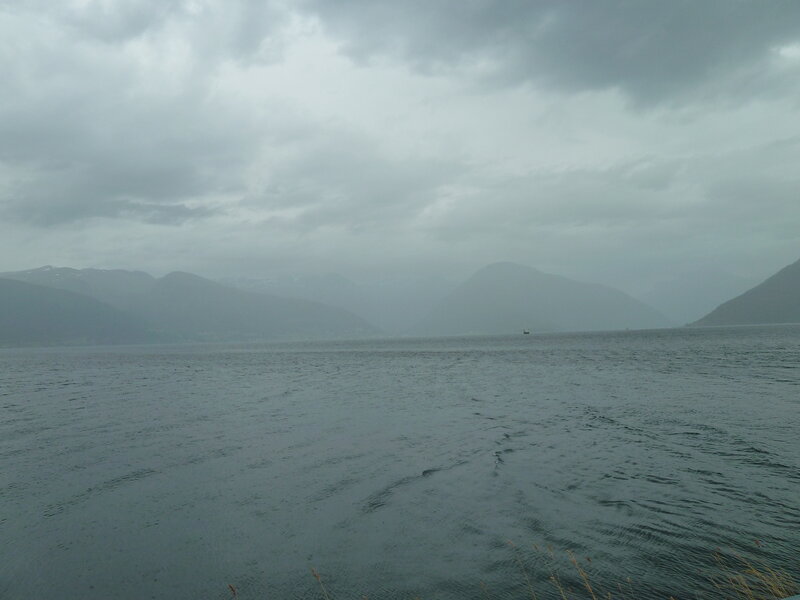 Foggy Fjord with Mountains