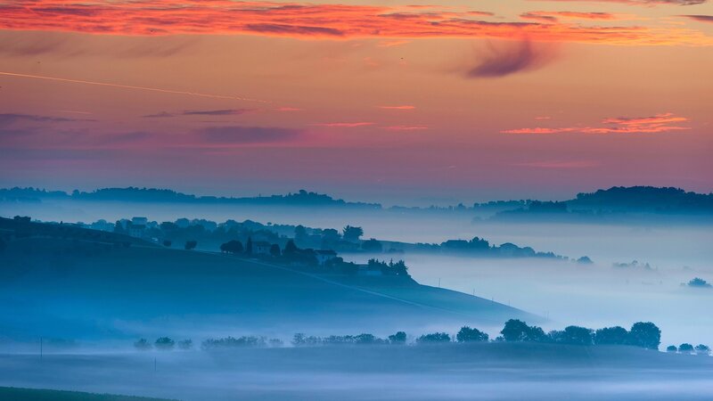 Foggy Hills at Sunrise — Orange, Serene, Photograph