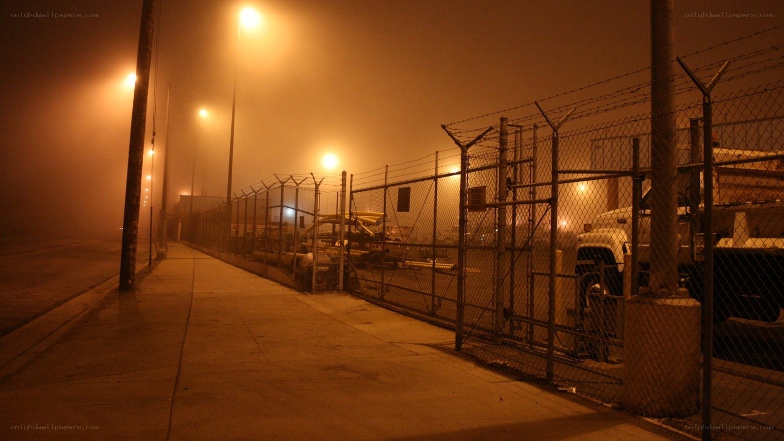 foggy industrial night scene