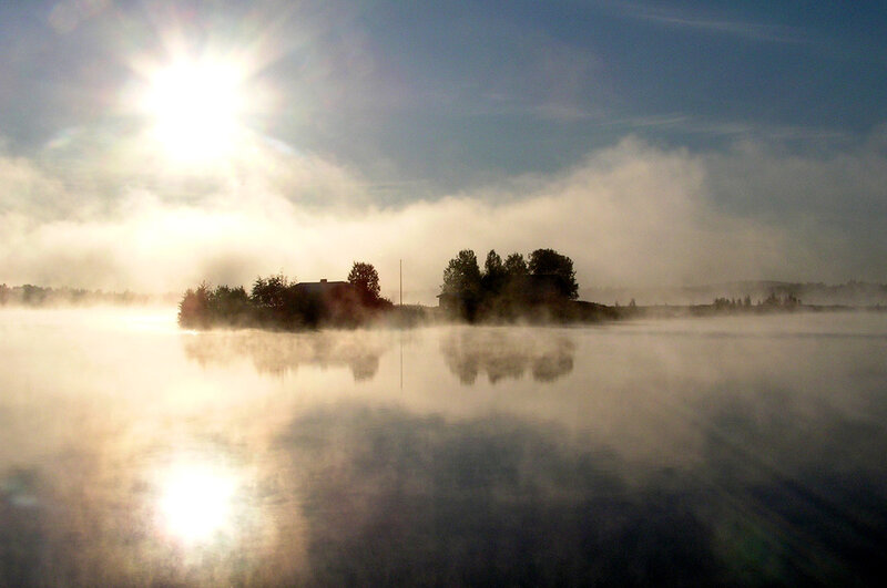 Foggy lake at sunrise