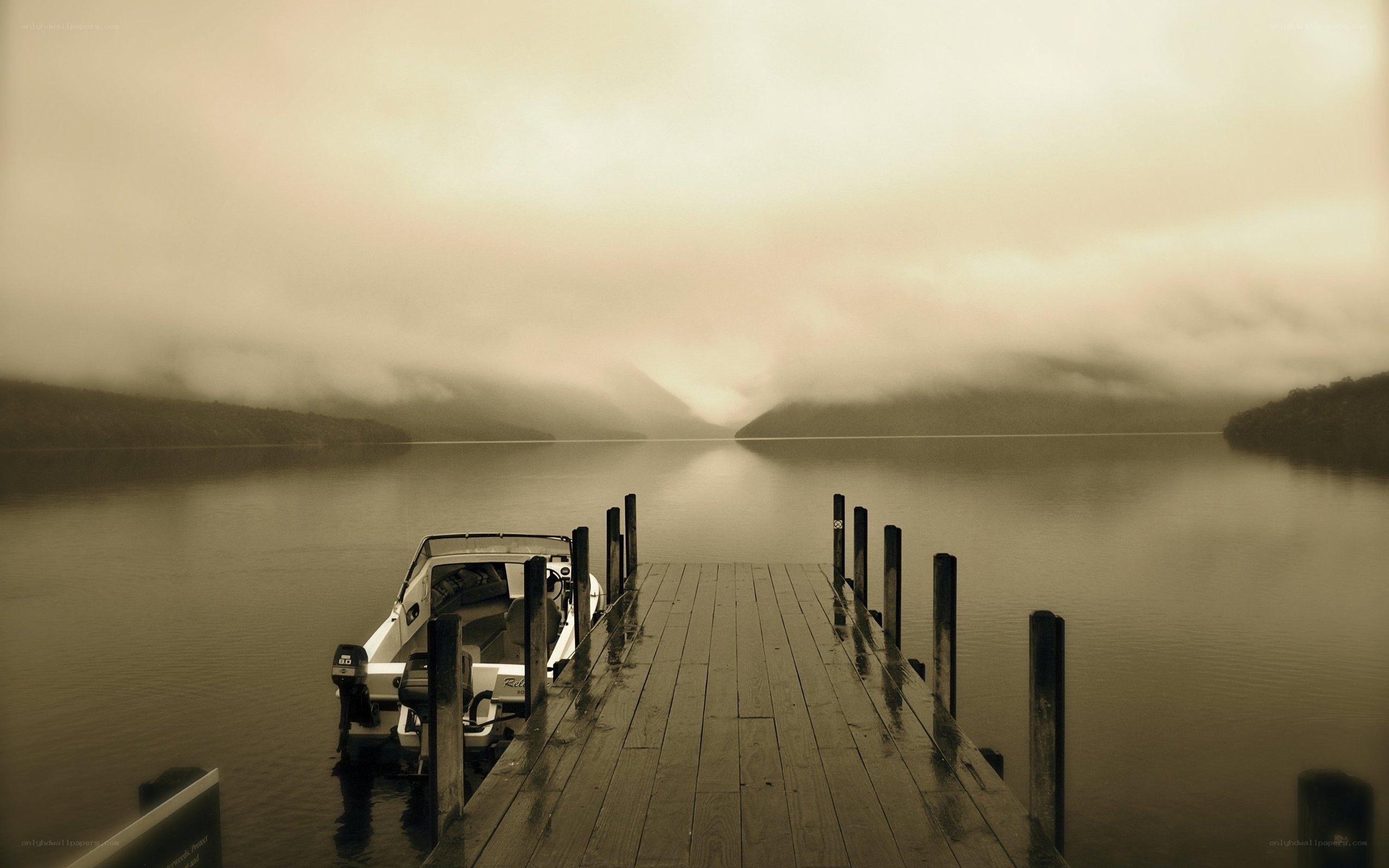 Foggy lake dock scene