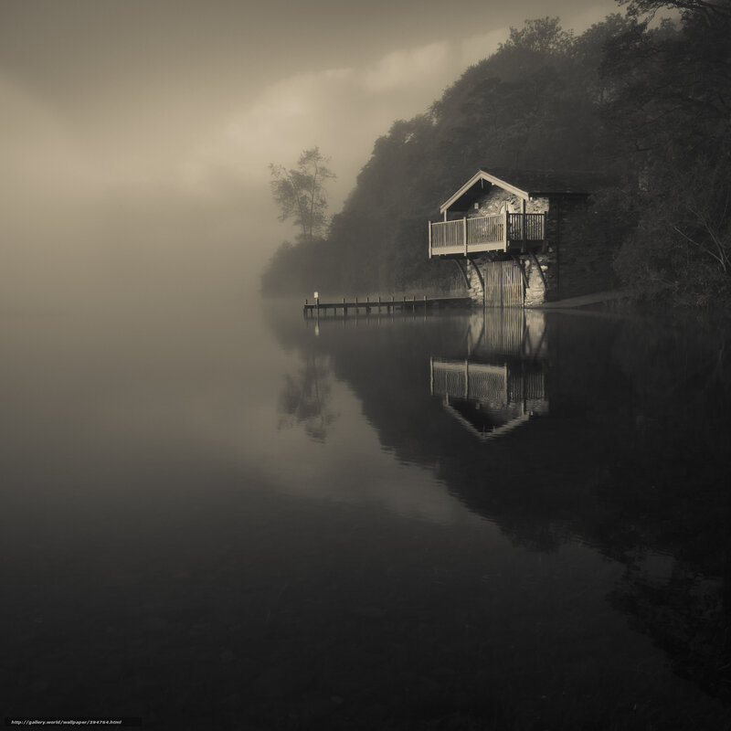 Foggy lake house at dawn