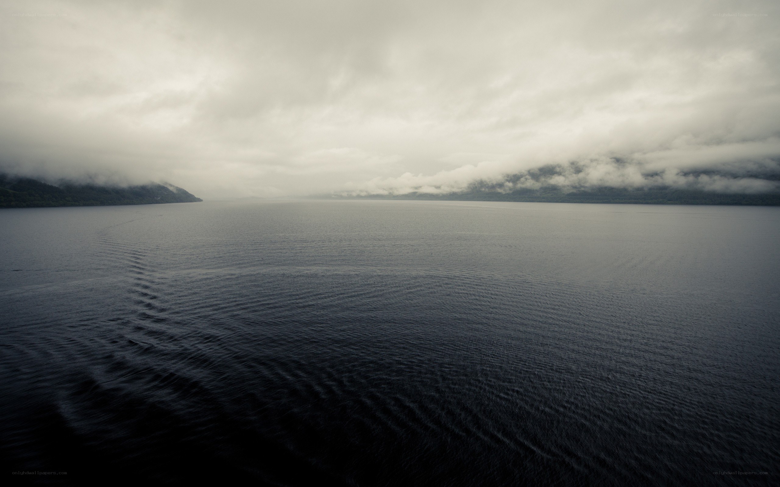 foggy lake with mountain views