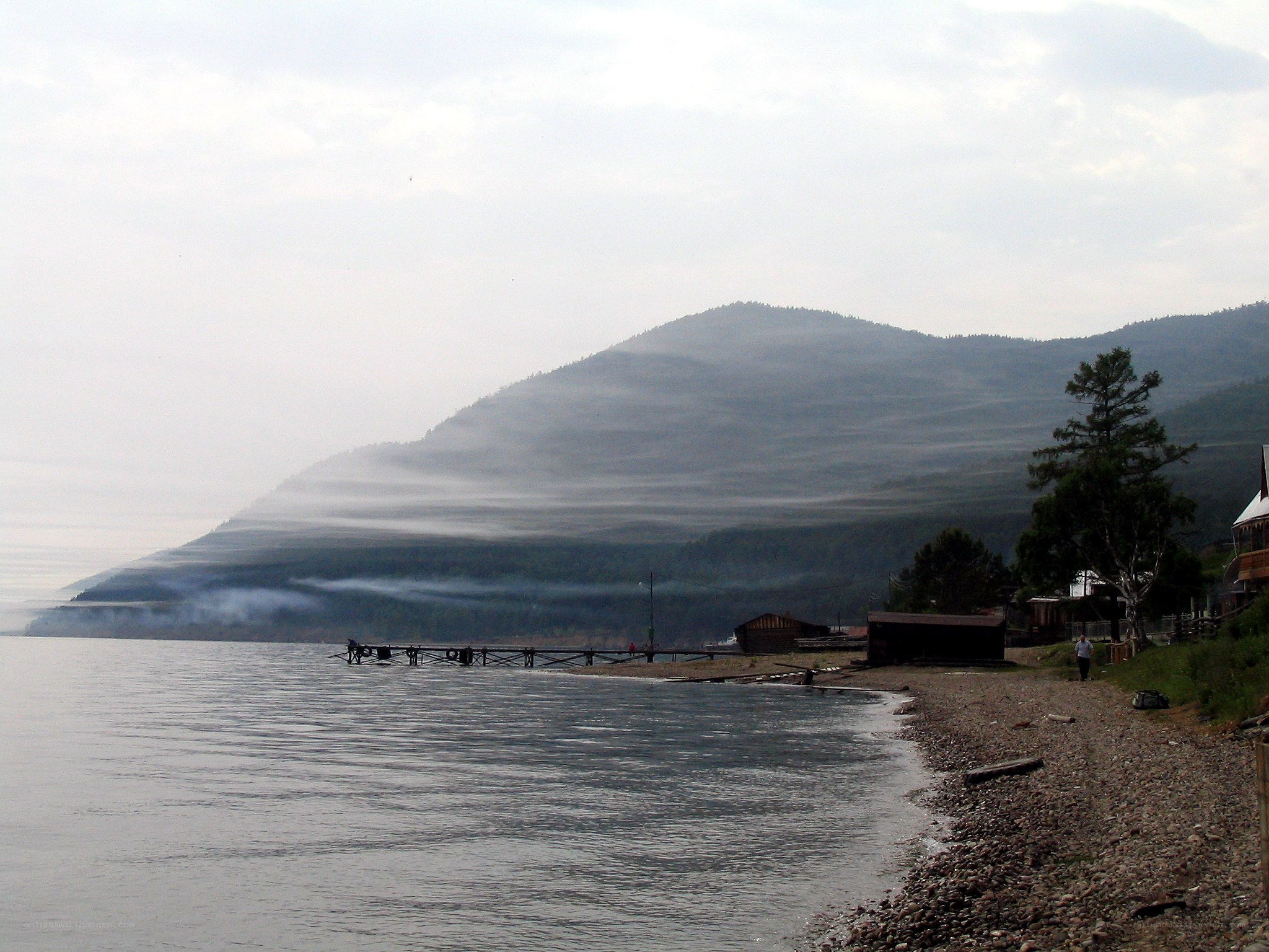Foggy lake with mountains