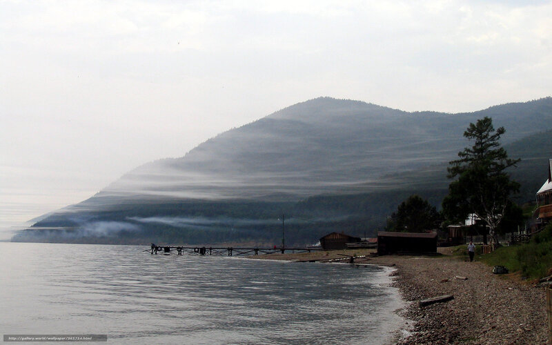 Foggy lake with mountains