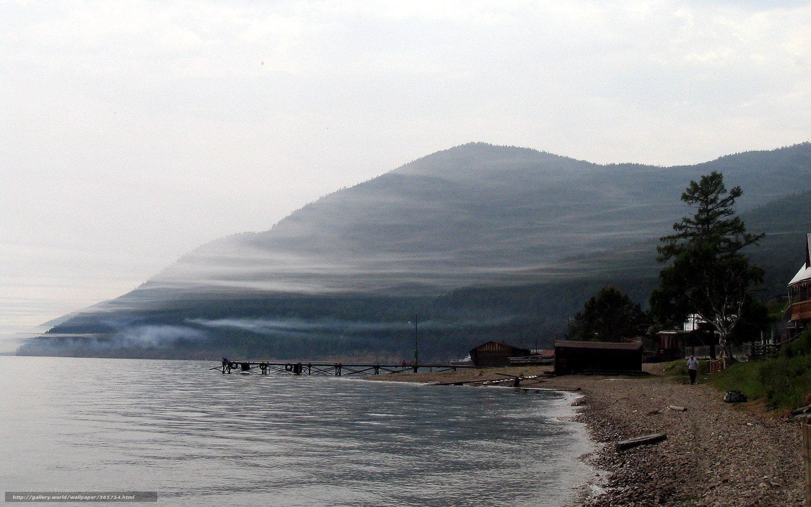 Foggy lake with mountains
