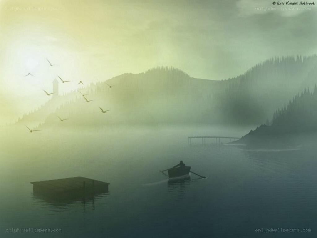 Foggy lake with rowboat