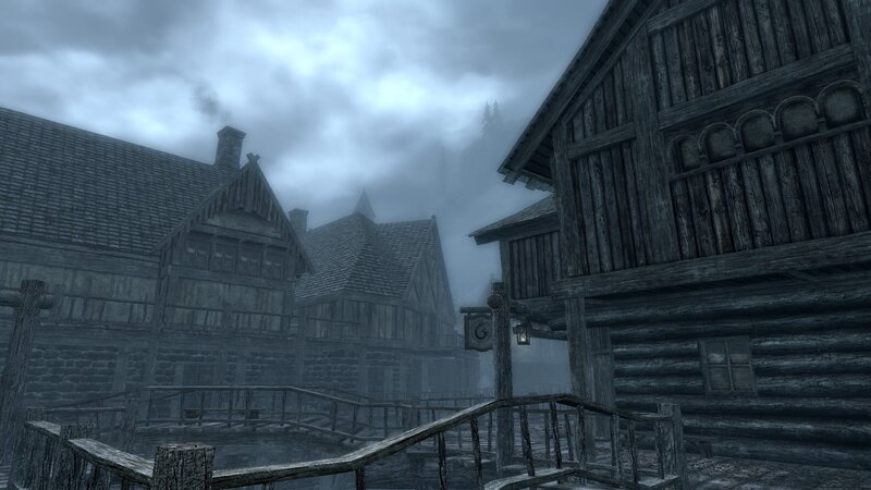 foggy medieval village scene