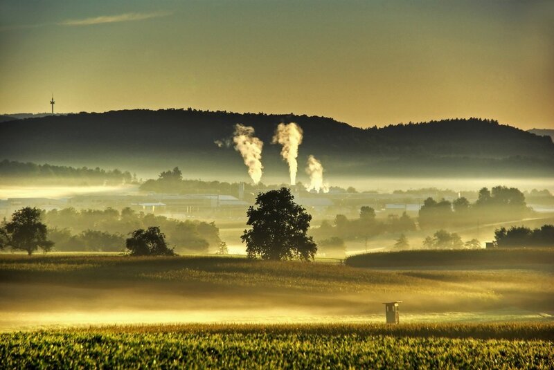 Foggy morning over industrial valley