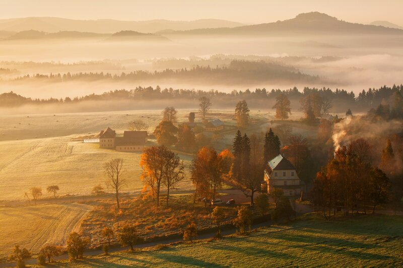Foggy morning over rural landscape