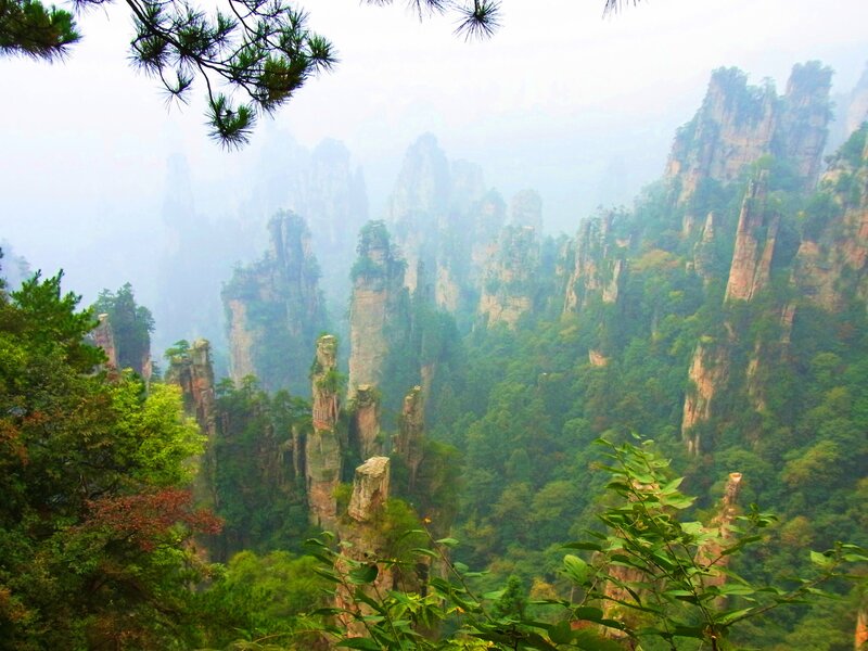 Foggy mountain pillars in China