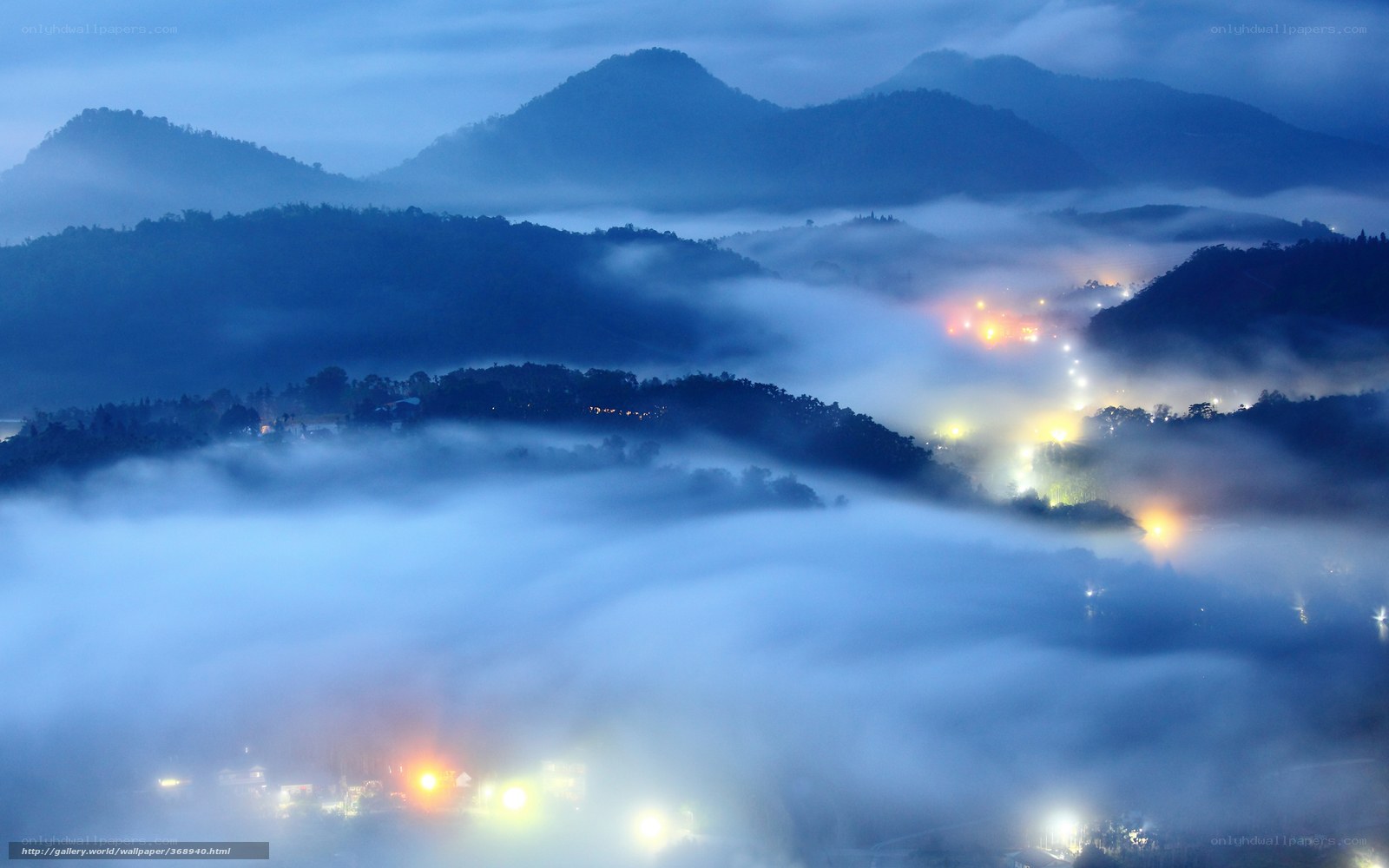 Foggy mountain village at dawn