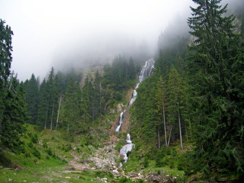 Foggy mountain waterfall