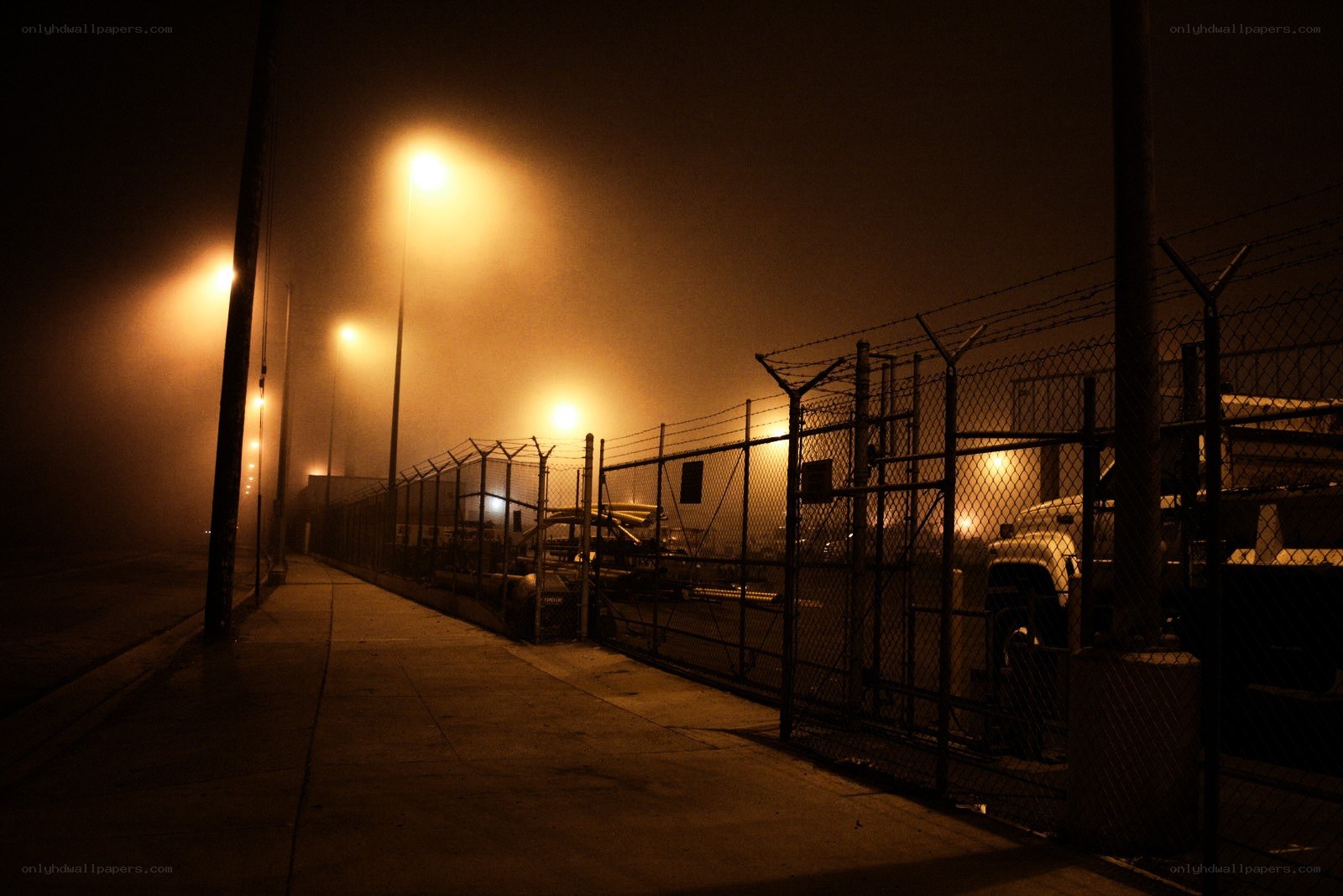 foggy night at industrial yard