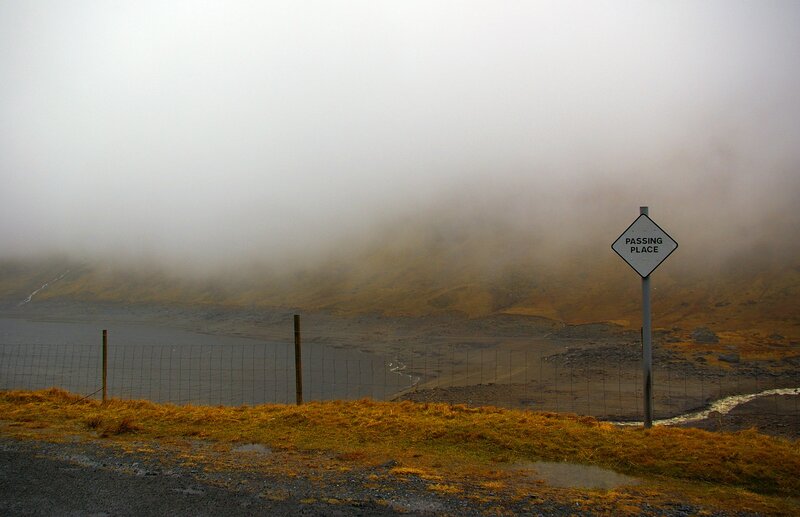Foggy passing place sign