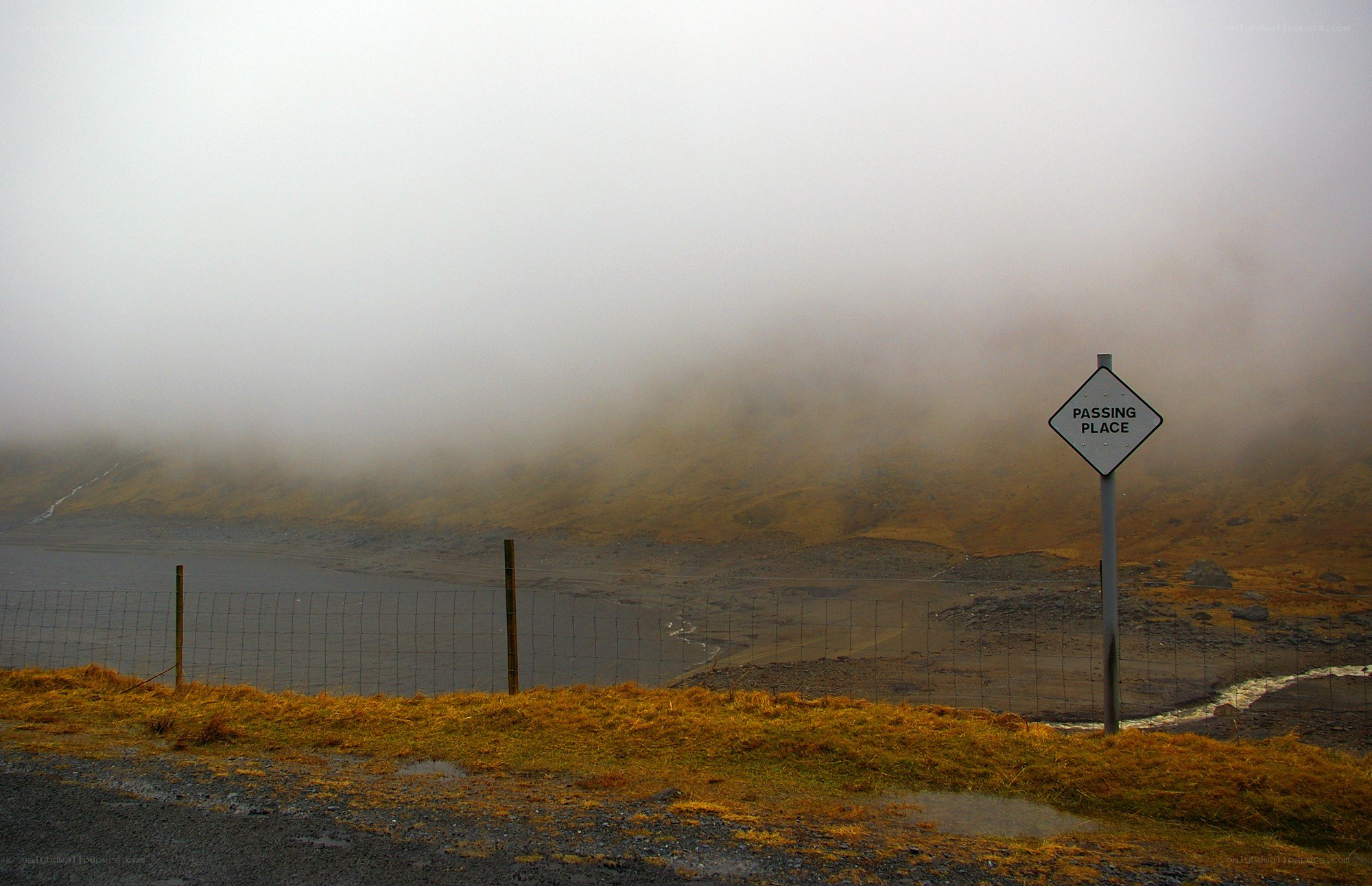 Foggy passing place sign