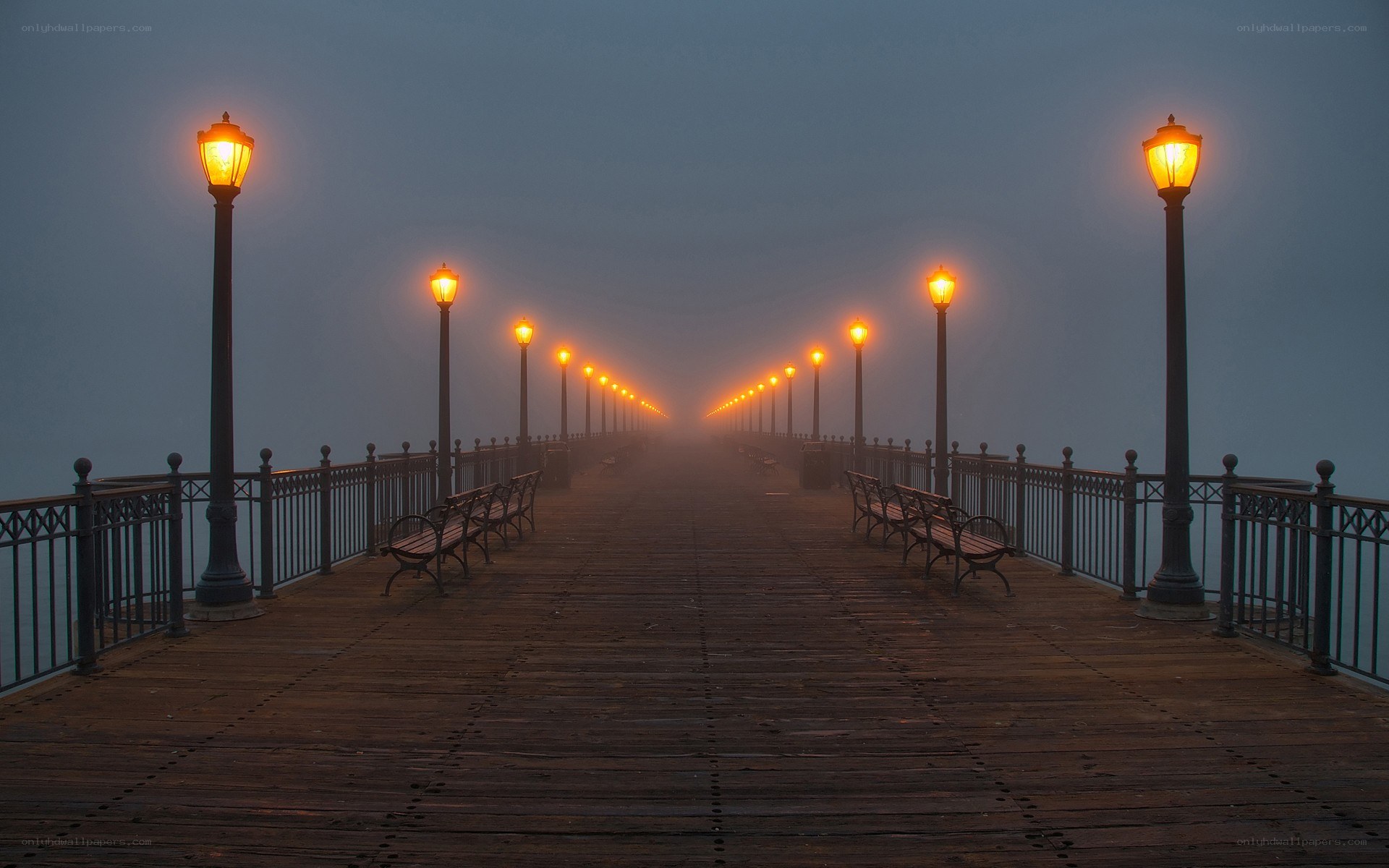 Foggy pier at dawn
