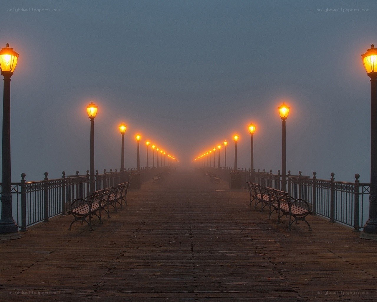 Foggy pier at dawn