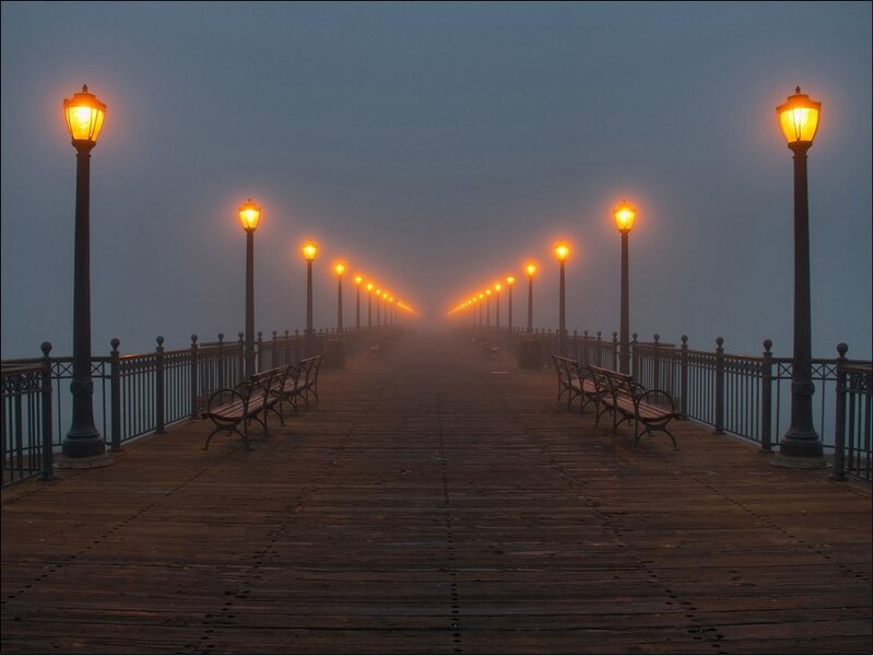 Foggy pier at dawn