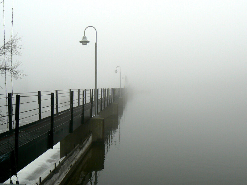 Foggy pier on a calm day