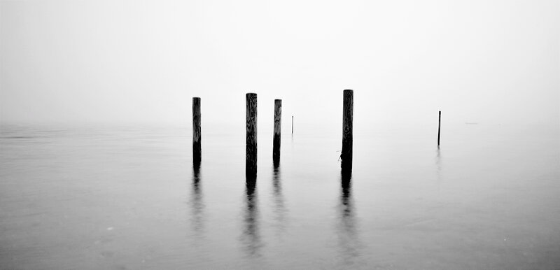 Foggy pier posts
