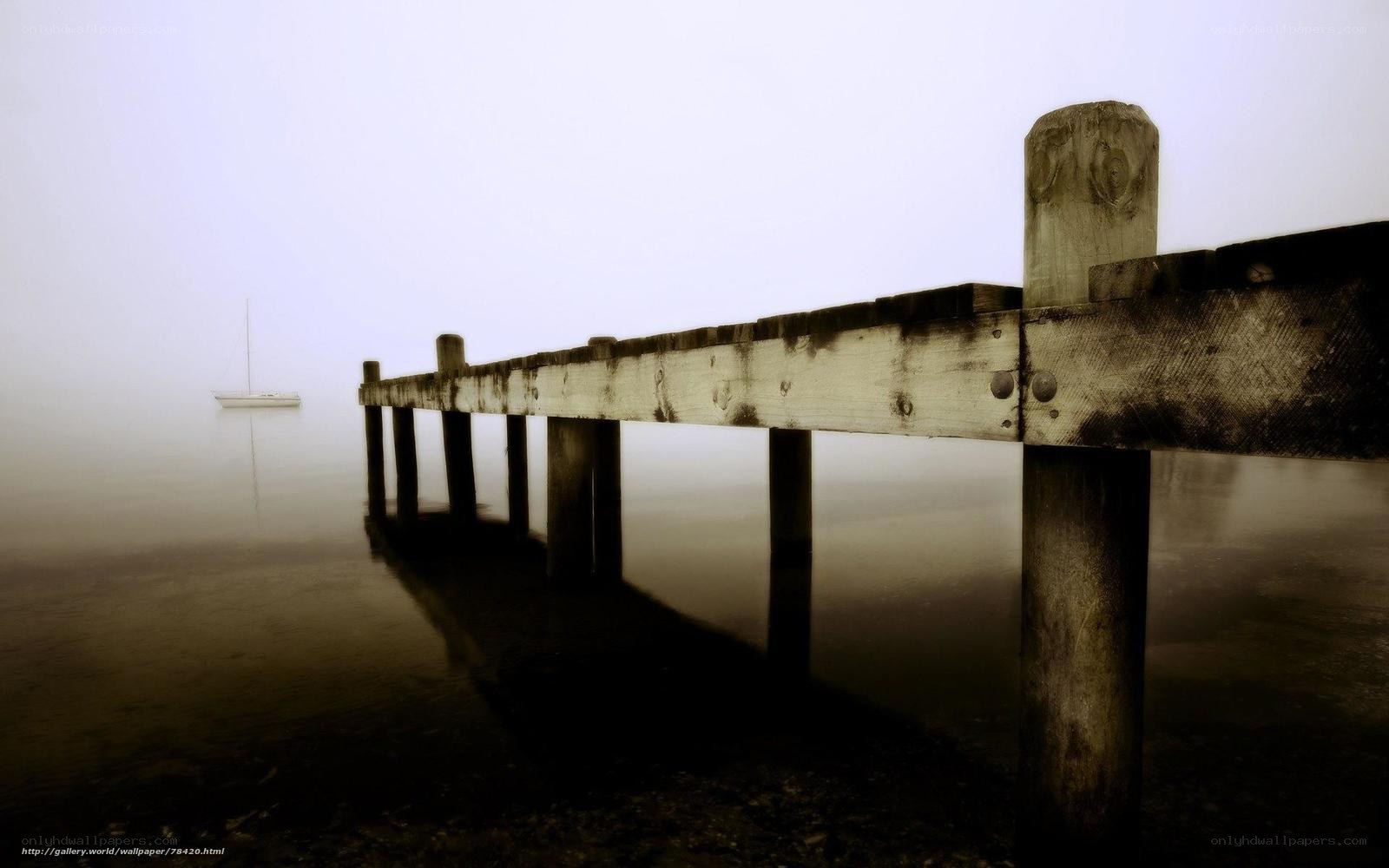 Foggy Pier with Sailboat