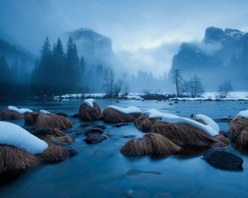 Foggy river in winter