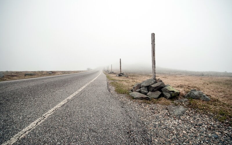 foggy road in open landscape