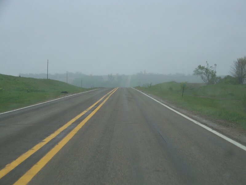 foggy road in rural area