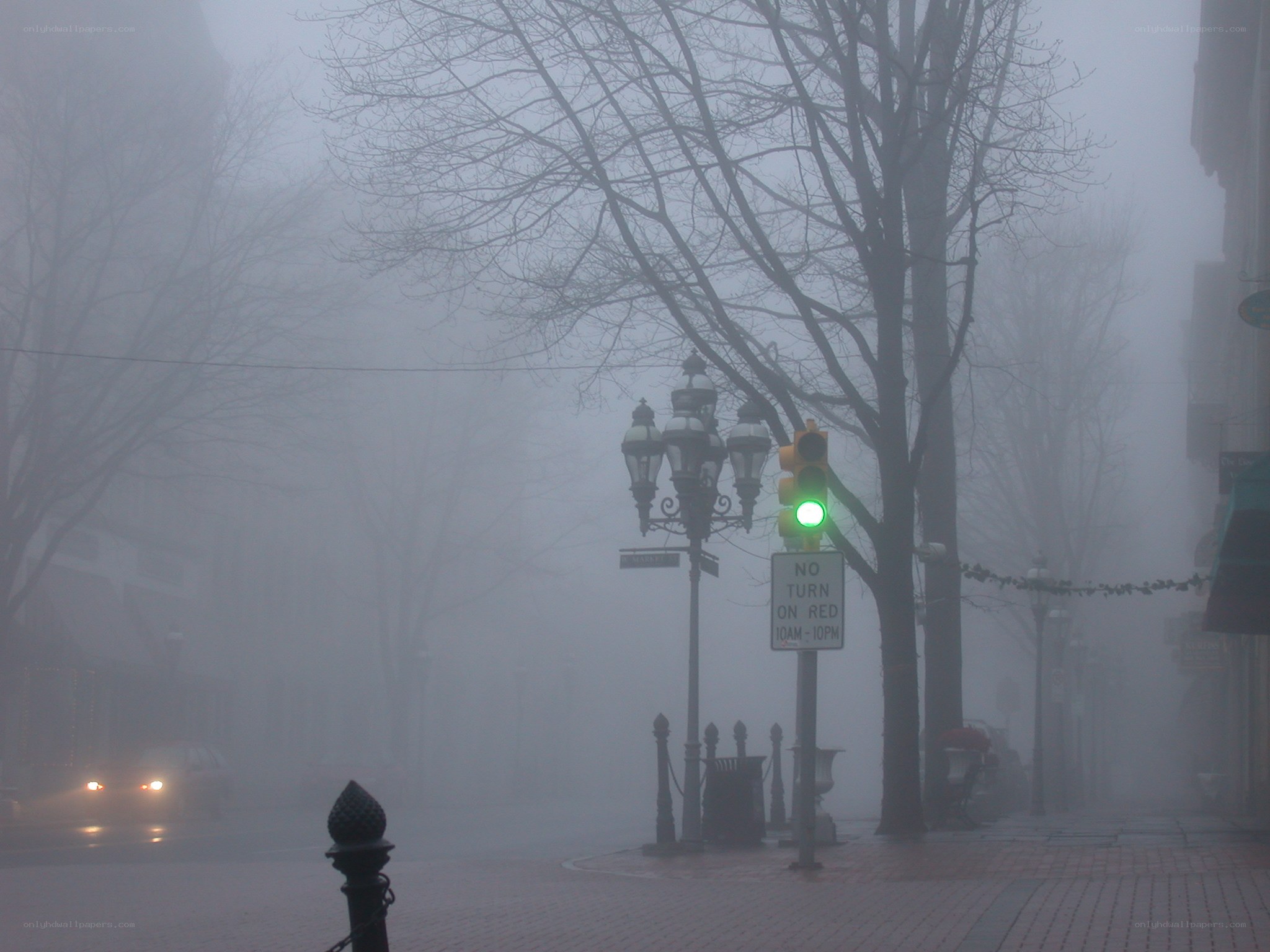 foggy street with green light