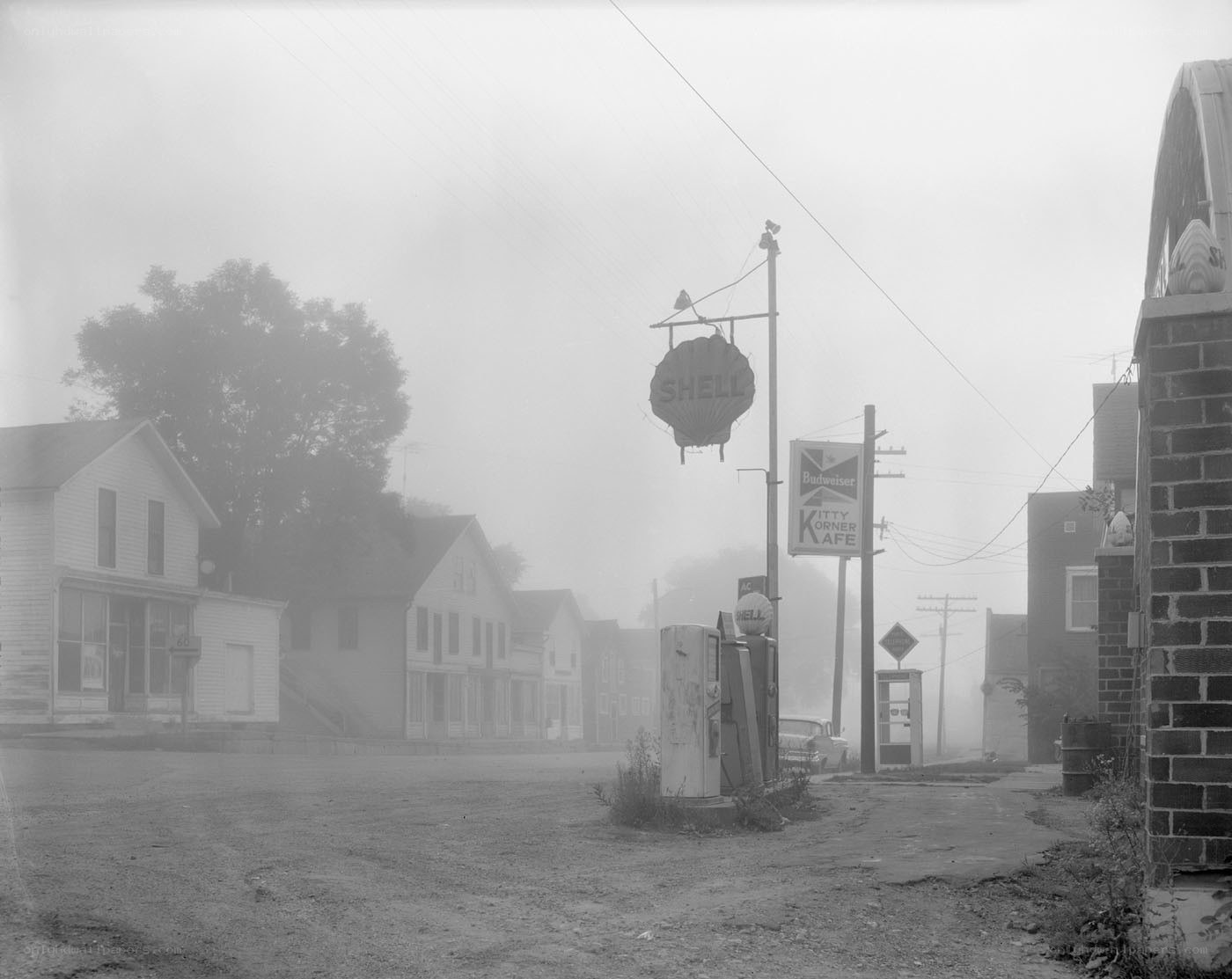 Foggy street with Shell gas station
