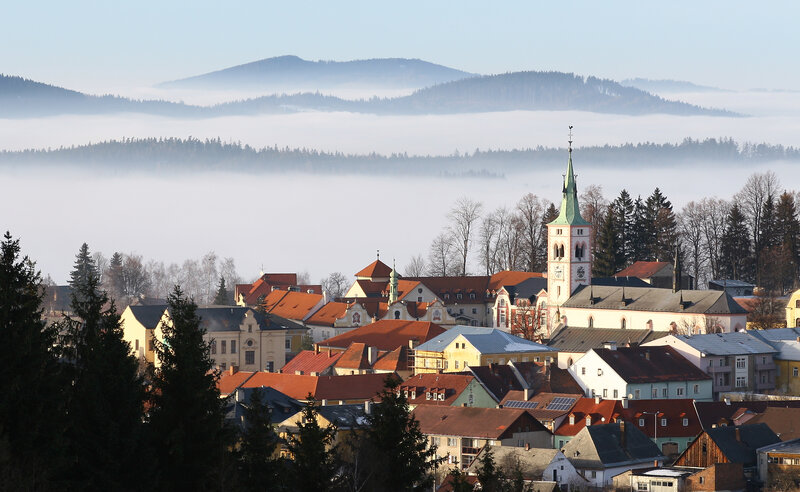 foggy town with church spire