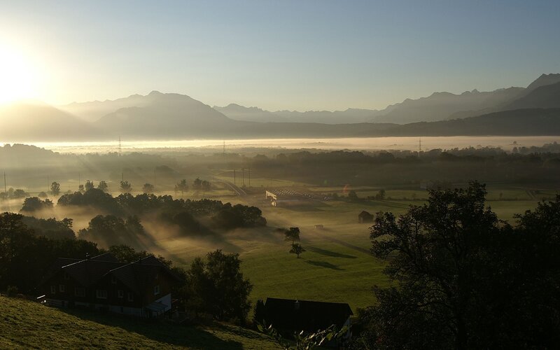 Foggy Valley at Sunrise — Green, Serene, Photograph, Mountains