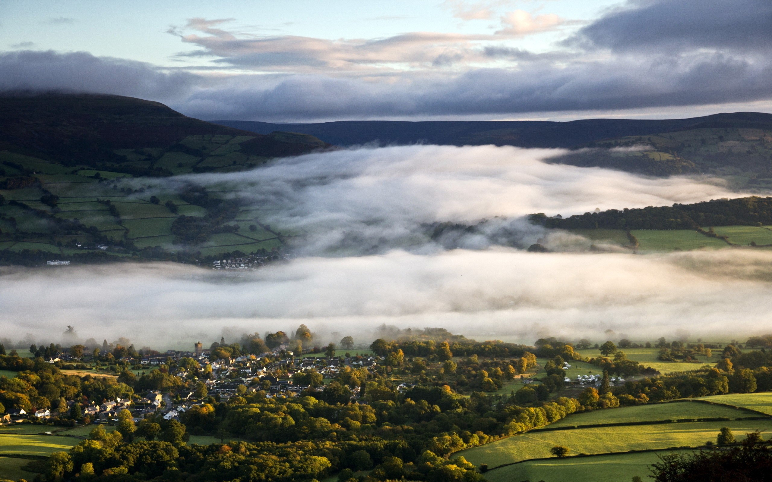 Foggy valley landscape at dawn