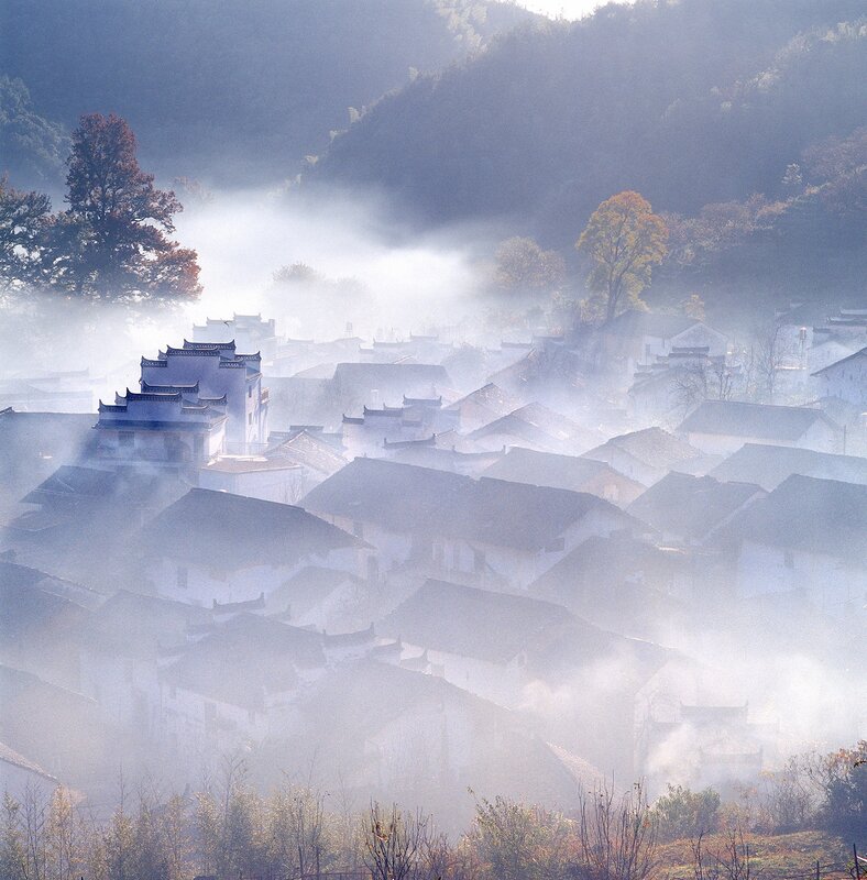 Foggy village in the mountains
