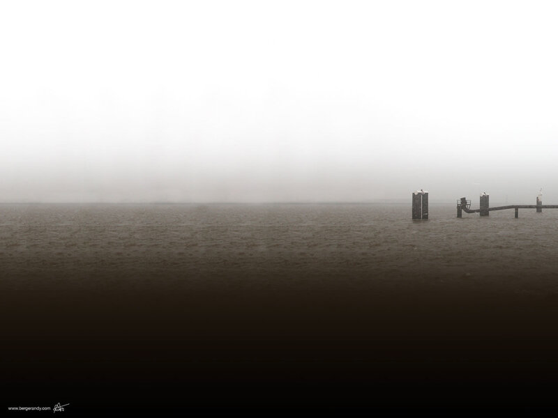 foggy water with pier