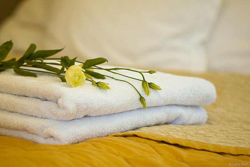 Folded Towels with Flower — White