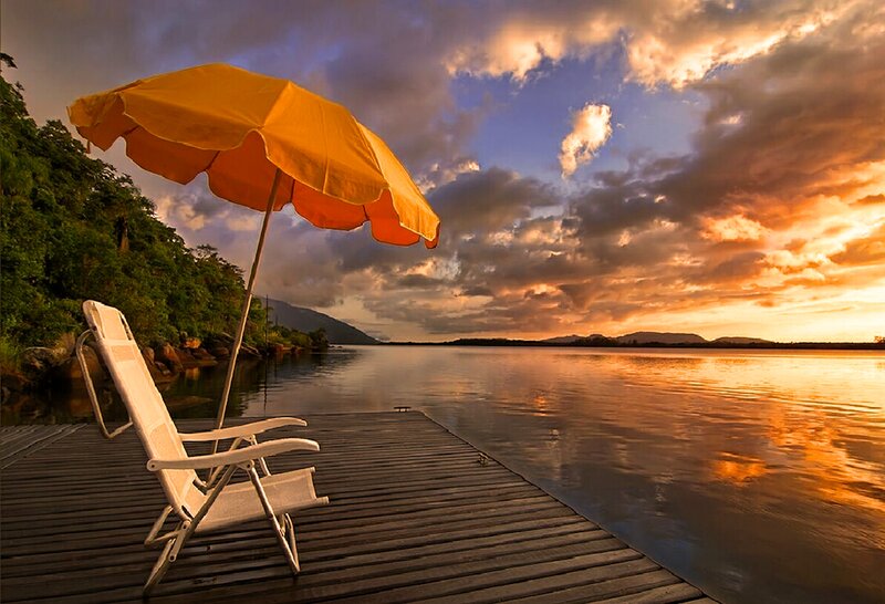Folding Chair on Dock — Orange