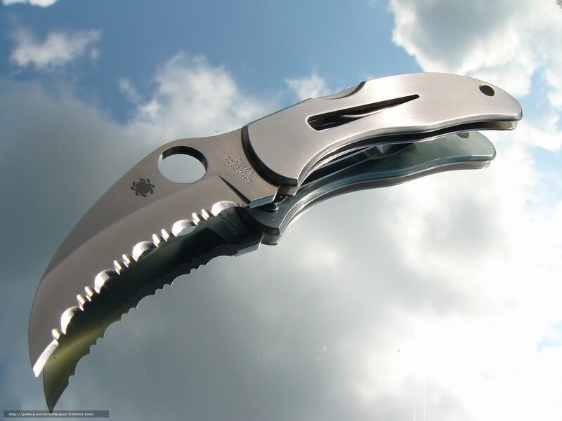 folding knife against sky