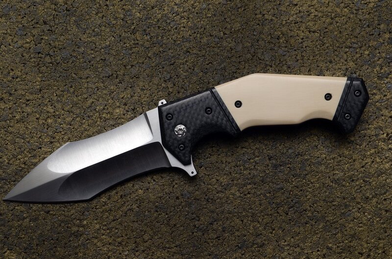 Folding Knife on Asphalt
